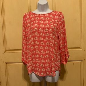 Adorable pink blouse with elephant print